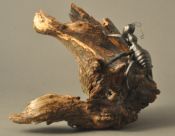 Metal iron ant on wood
